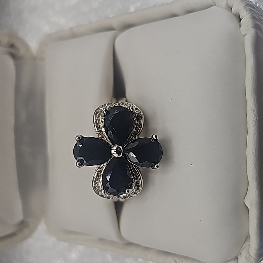 Onyx and diamond ring